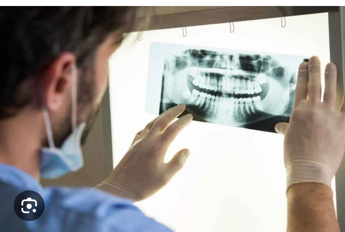 Dr. Mustafa Saad, DDS, Tooth extraction, Wisdom tooth removal , dental implants, iv sedation bone grafting, Smile Solutions, tooth pain, Dentist in the US